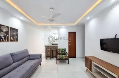 Apartamento com varanda e vista mar na quadra mar da praia das pitangueiras, guaruja