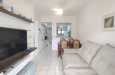 Apartamento reformado com varanda a venda na praia das asturias, guaruja
