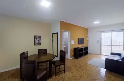 Apartamento com varanda e vista livre na praia das asturias, guaruja