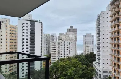 Apartamento com varanda e lazer na praia das pitangueiras, guaruja