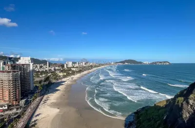 Apartamento frente mar com varanda e lazer na praia das pitangueiras, guaruja