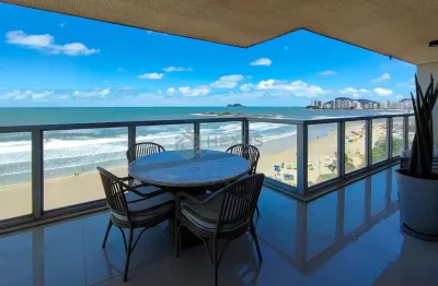 Apartamento reformado frente mar com varanda na praia das pitangueiras, guaruja