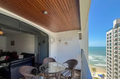 Apartamento com varanda e vista mar na quadra mar da praia das pitangueiras, guaruja
