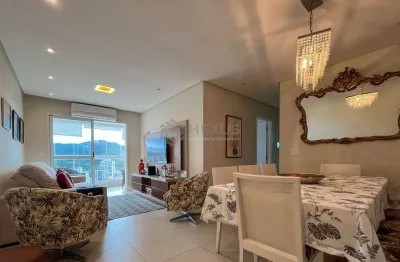 Apartamento com varanda, vista mar e lazer de clube na praia das asturias, guaruja