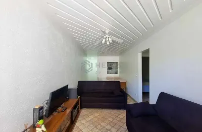 Apartamento com custo baixo a duas quadras da praia das pitangueiras, guaruja