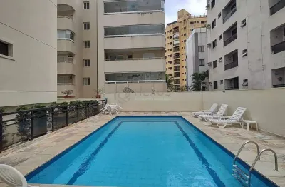 Apartamento com varanda e lazer na praia da enseada à venda, guaruja