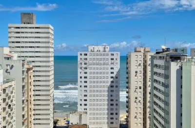 Apartamento com varanda e lazer na praia das pitangueiras, guaruja