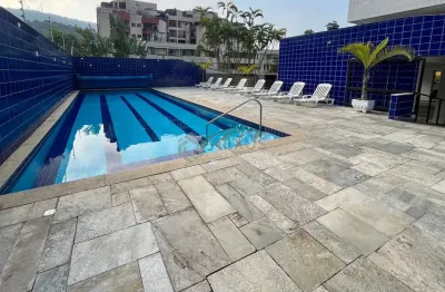 Apartamento beira mar com varanda e lazer de clube na praia da enseada, guaruja