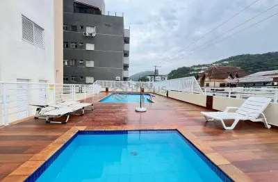 Apartamento com varanda e lazer na praia da enseada, guaruja