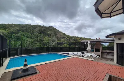 Apartamento com lazer a duas quadras da praia das pitangueiras, guaruja