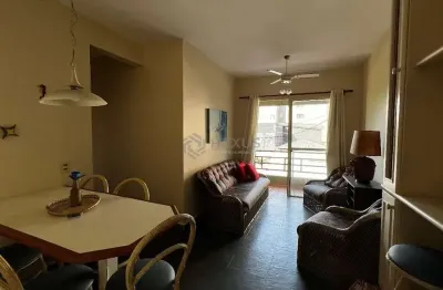 Apartamento com varanda e lazer na praia da enseada, guaruja