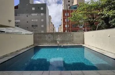Apartamento com varanda e lazer na praia da enseada, guaruja