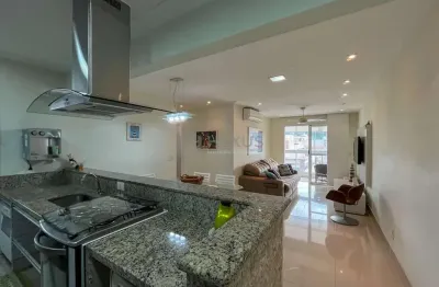 Apartamento com varanda e lazer de clube na praia das asturias, guaruja