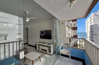 Apartamento reformado com varanda e vista mar na quadra mar da praia das pitangueiras, guaruja