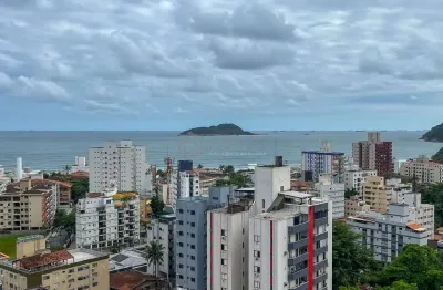 Apartamento com varanda, vista mar de clube na praia das asturias, guaruja