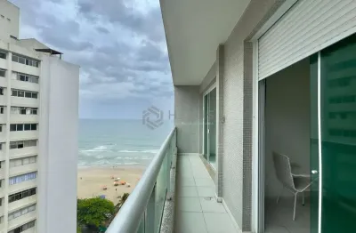 Apartamento com varanda e vista mar na beira mar da praia das pitangueiras, guaruja