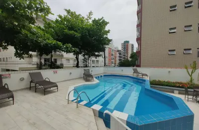 Apartamento com varanda e lazer na praia das asturias, guaruja
