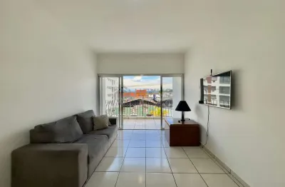 Apartamento frente rua com varanda na praia das asturias, guaruja