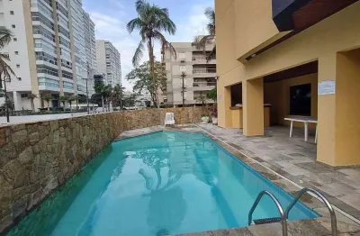 Apartamento com varanda e lazer na praia da enseada, guaruja