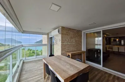 Apartamento reformado frente mar com varanda gourmet e lazer em prédio na praia das asturias, guaru