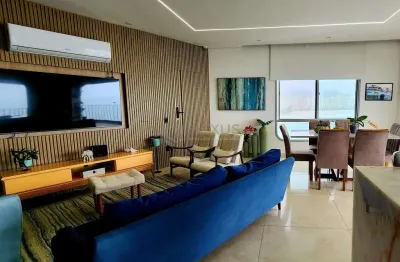 Apartamento reformado frente mar com varanda e lazer na praia das asturias, guaruja