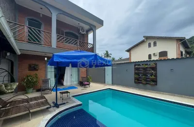 Casa com piscina e churrasqueira no jardim albamar, guaruja