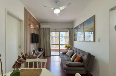 Apartamento com varanda e vista mar na Praia das Pitangueiras, Guaruja