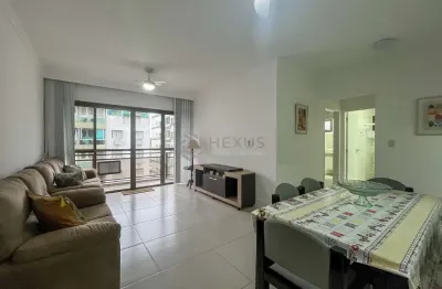 Apartamento reformado com varanda na Praia do Tombo, Guaruja