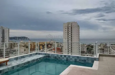 Apartamento com varanda e lazer na Praia da Enseada, Guaruja