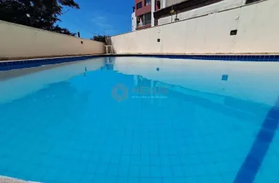 Apartamento com varanda e lazer na Praia da Enseada, Guaruja