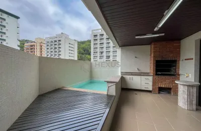 Apartamento com piscina e churrasqueira na varanda na Praia das Pitangueiras, Guaruja