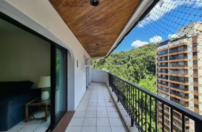 Apartamento com varanda e lazer na Praia das Pitangueiras, Guaruja