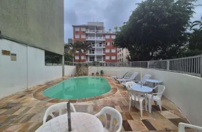 Apartamento com varanda e lazer na Praia das Asturias, Guaruja