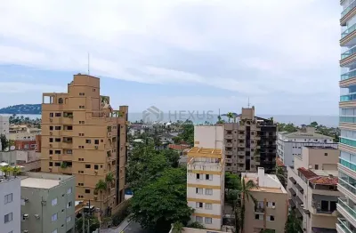 Apartamento com varanda gourmet e vista mar na Praia da Enseada, Guaruja