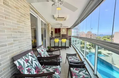 Apartamento com varanda gourmet e lazer de clube na Praia da Enseada, Guaruja