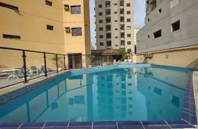 Apartamento com varanda e lazer na Praia da Enseada, Guaruja