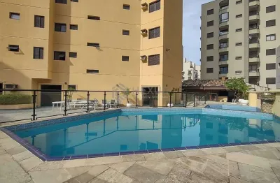 Apartamento com varanda e lazer na Praia da Enseada, Guaruja