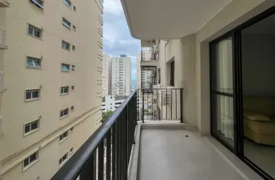 Apartamento com varanda e lazer na Praia das Pitangueiras, Guaruja