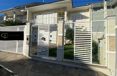 Excelente sobrado com 04 dormitórios, sendo 01 suíte, no moinhos de vento em canoas