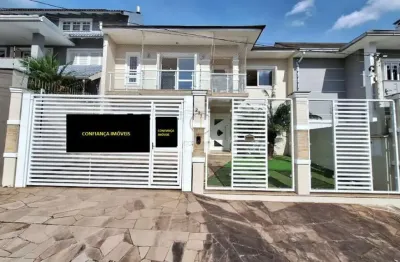 Excelente sobrado com 04 dormitórios, sendo 01 suíte, no moinhos de vento em canoas