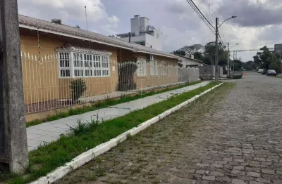 Casa à venda na Rua dos Girassóis, 118, Igara, Canoas