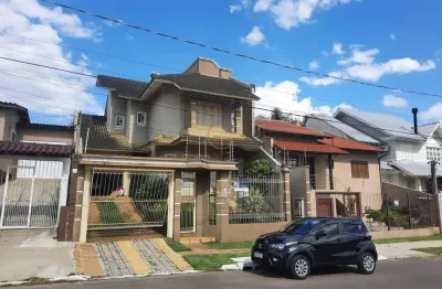 Casa / sobrado com 3 dormitórios/suite no bairro mont serrat em canoas rs
