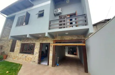 Casa à venda na Rua Jandir Maya Faillace, 55, São José, Canoas