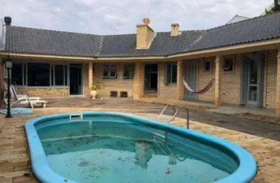 Excelente casa térrea com 03 dormitórios, sendo 01 suíte, no niterói em canoas