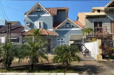Casa com 3 quartos à venda na Rua Andrômeda, 359, Moinhos De Vento, Canoas