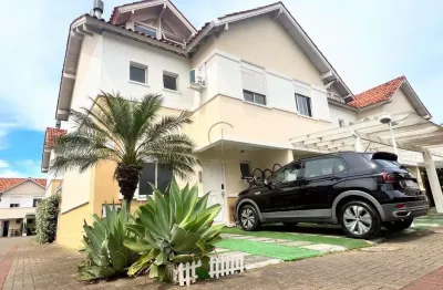 Sobrado de esquina em condomínio, 03 dormitórios, sendo 01 suíte, 02 vagas para veículos  no bairro moinhos de vento