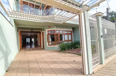 Sobrado usado com 169.09m² em canoas - harmonia: churrasqueira, porcelanato e mais