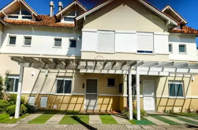 Sobrado 03 dorm. semi-mobiliado, sendo 01 suíte, pátio, churrasqueira, sótão/lareira e 02 vagas para veículos no cond. quintas do moinhos no bairro moinhos de vento