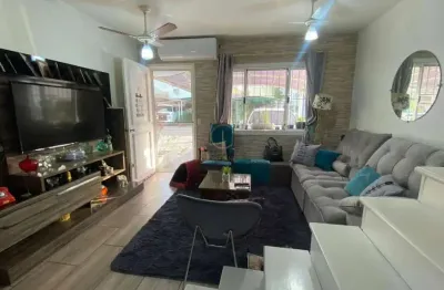 Sobrado em condomínio com 03 dormitórios, sendo 01 suíte. no rio branco em canoas