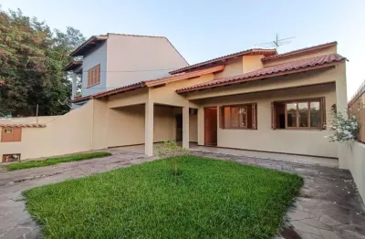 Casa à venda em Canoas, São Luis, com quintal e churrasqueira